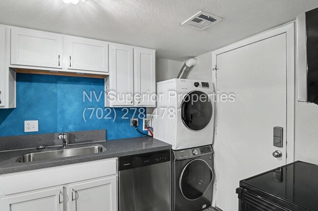 Building Photo - SE!! Close to UNLV!! 2 Bedroom 2 story!! 1 Car Carport!! Fully Furnished!! Community Pool!! and T...