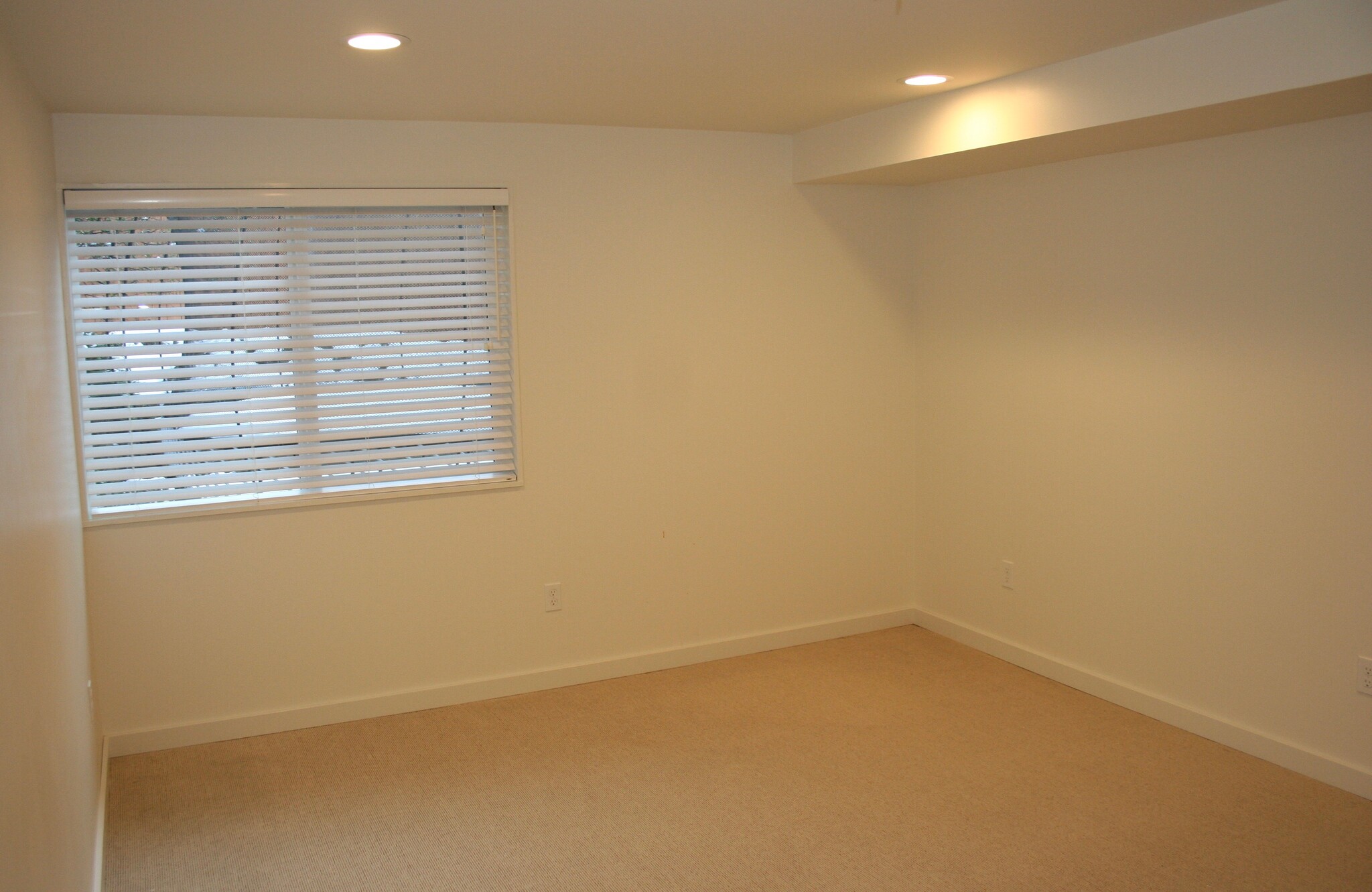 Second room of apartment, quite large. Has a Ikea set of closets in it now. - 3518 Northeast 94th Street