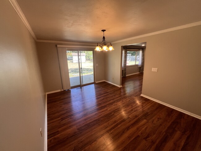 Dining room and doors to the patio. - 1298 Cedarcliff Dr