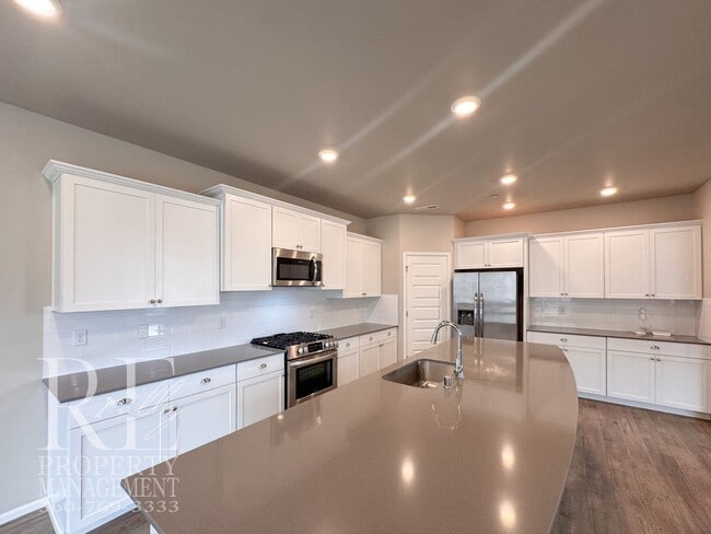 Building Photo - Warm & Inviting 4-Bedroom Home with Vaulted Ceilings, Loft, Fireplace & Fenced Backyard