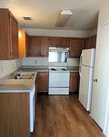 Kitchen with Pantry, Refrigerator, Oven, & Dishwasher - 9831 Ardash Ln