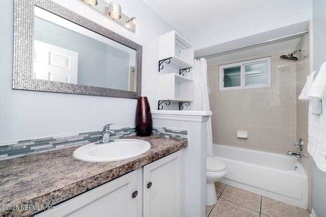 Building Photo - 7119 Swamp Flower Dr N
