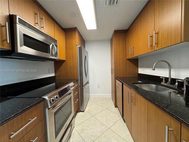 Building Photo - 10275 Collins Ave