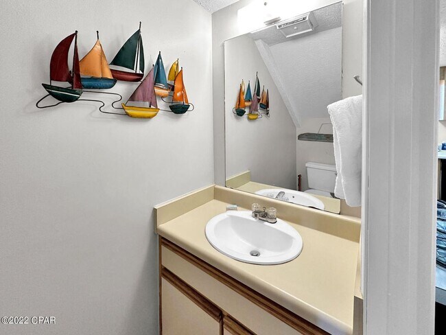 Building Photo - Fully Furnished, with All Utilities and Golf Cart, Townhome Panama City Beach