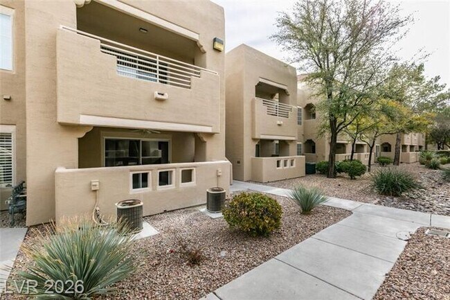 Building Photo - Beautiful Condo in a sought-after Gated Summerlin Community!