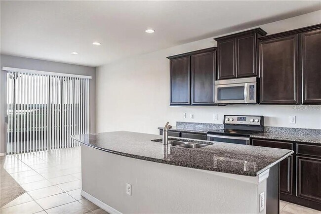 Building Photo - 9215 Mountain Magnolia Dr