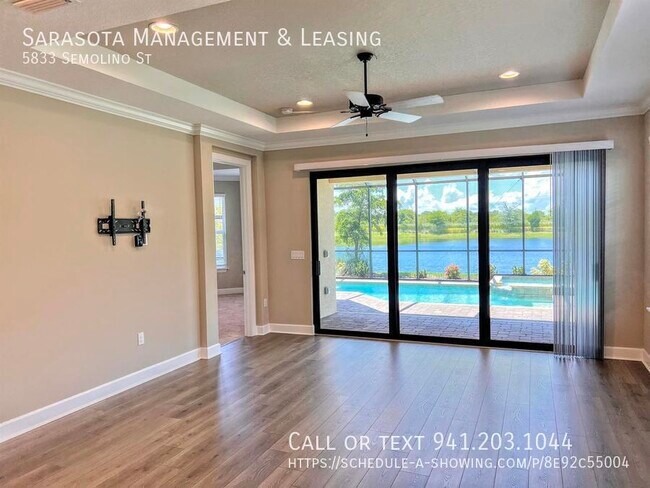 Building Photo - 2 Bed 2 Bath with Den Lake View Pool Home ...