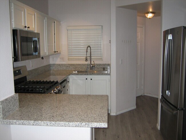 Building Photo - Condo on 2nd floor - Move-in Ready - 3 bed...
