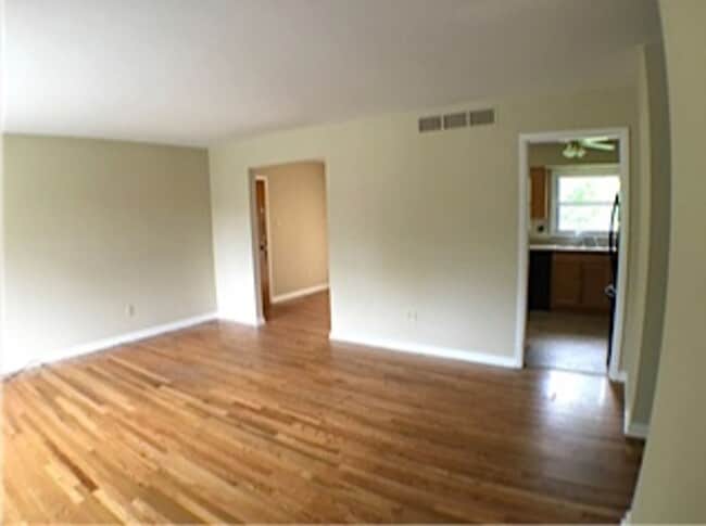 Building Photo - Three Bedroom Home with Fenced Yard