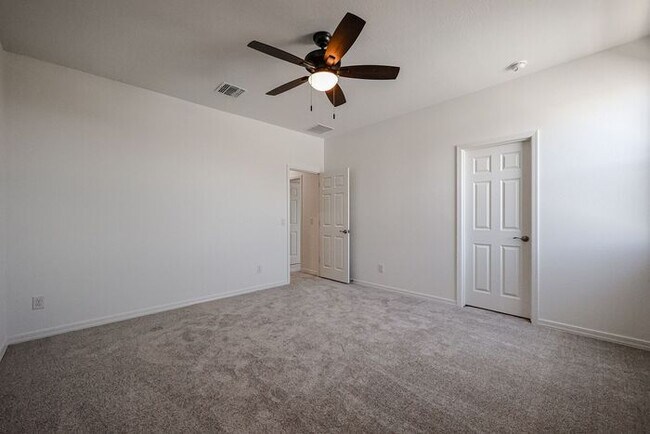 Building Photo - HOME IN LAVEEN! 4 BED 3.5 BA 3 CAR GARAGE!...