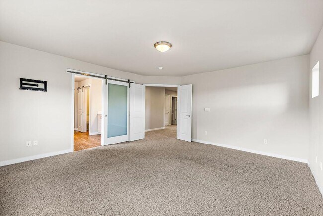 Building Photo - Modern 4-Bedroom Yelm Home with Covered Patio, Outdoor Fireplace & Office/Flex Space!