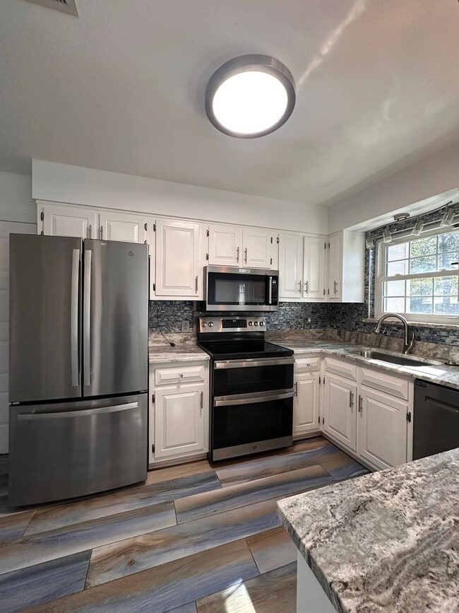 Building Photo - The BEST location there is-- Newly Renovated 3 bedroom home!