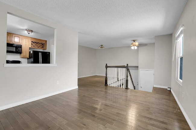 Building Photo - $2,720.95 - 4 bed, 2 bath, located in Aurora with attached Garage and In Unit Washer and Dryer!