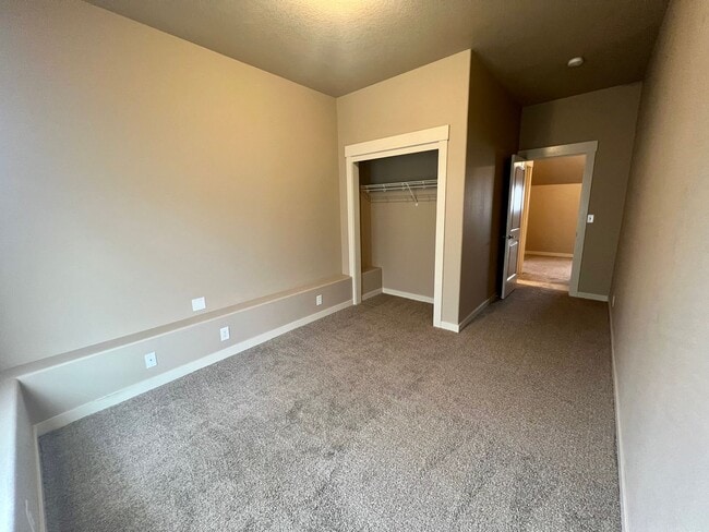 Building Photo - Spacious 4-Bedroom Home—Quick Drive to Dow...