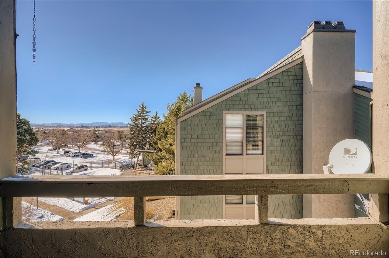 Mountain views from balcony (Note: Satellite dish has been removed) - 14282 E Tufts Pl