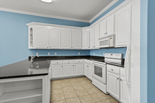 Building Photo - Riverfront Living with Spacious Layout and...