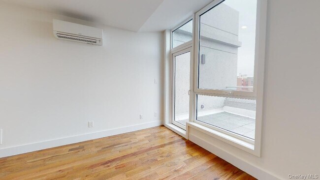 Building Photo - 138-28 Queens Blvd