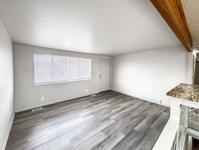Building Photo - Spacious 5-Bedroom Home with Lofted Garage