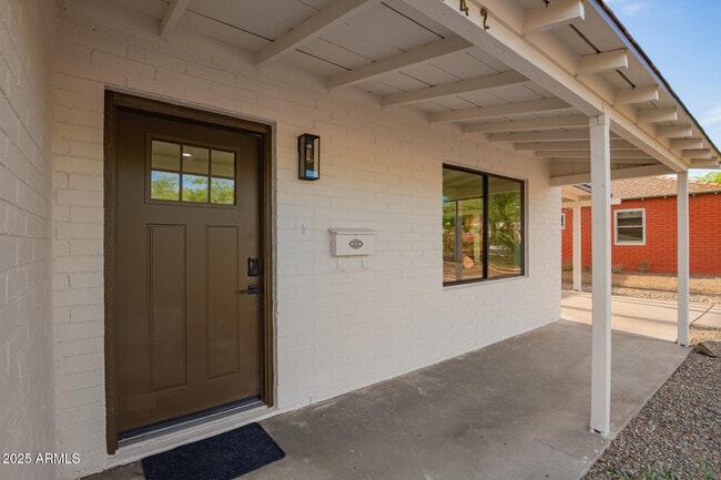 Building Photo - 9042 N 3rd Ave