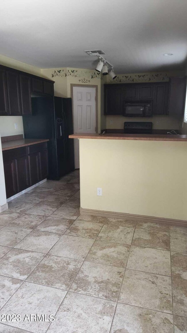 Building Photo - 13939 W Port Royale Ln