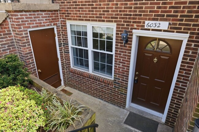 Building Photo - This beautifully refreshed condominium offers a refined blend of style and comfort