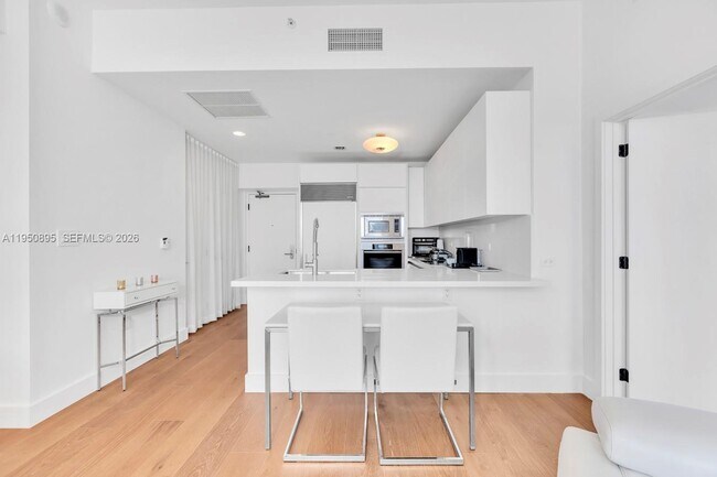 Building Photo - 6799 Collins Ave