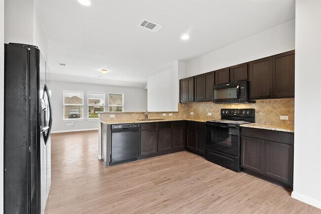 Building Photo - 13024 Tinker St