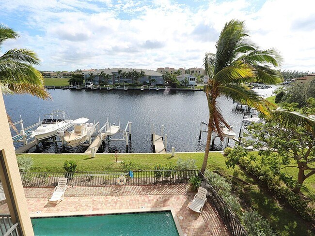 Building Photo - BEAUTIFUL 3-BEDROOM  WATERFRONT CONDO WITH BOAT SLIP AND HEATED POOL