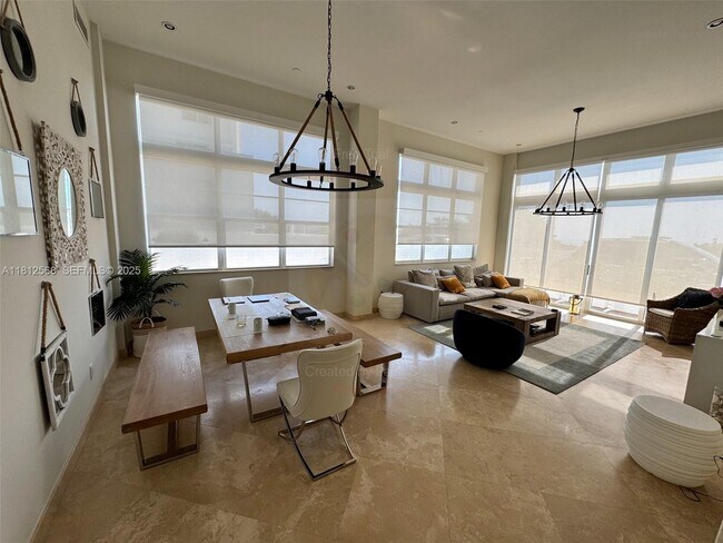 Building Photo - 6917 Collins Ave