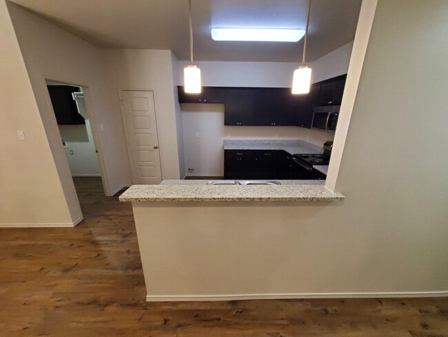 Building Photo - "Charming 3-Bedroom Duplex Retreat with 2 Baths in the Heart of Lubbock – 1360 Sq Ft of Cozy Livi...