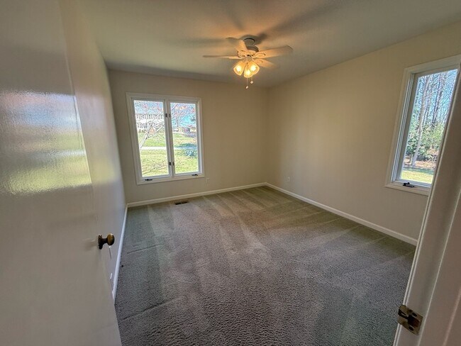 Building Photo - Spacious ranch, fenced yard, 2 car garage, large basement, near Wake Tech