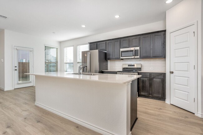 Building Photo - Brand-New 4 Bed | 2.5 Bath | Private Fenced Yard | Over 2,000 Sq Ft