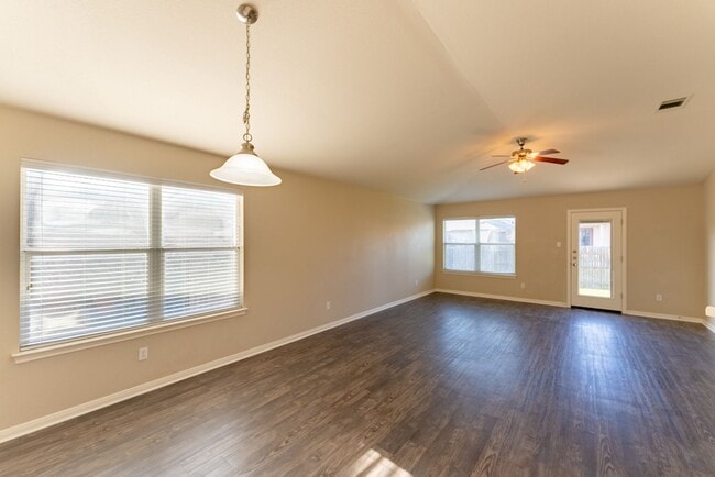 Building Photo - Charming Brick Home with Open Floorplan, Vaulted Ceilings, and Luxurious Amenities—Perfect for An...