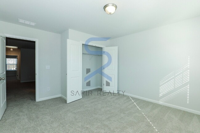 Building Photo - Move in before February 28th and choose your reward: a $250 Amazon Gift Card or a 55" Smart TV!