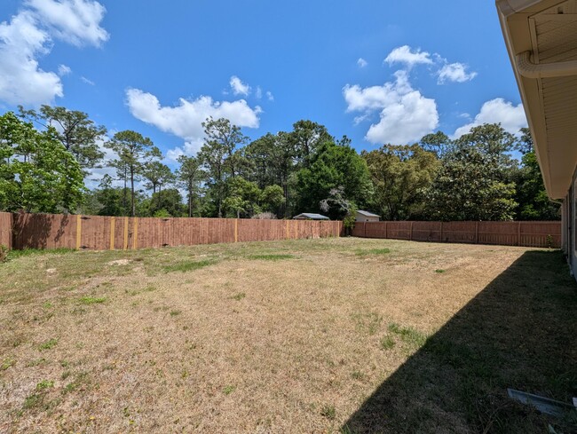Building Photo - 8934 E River Dr