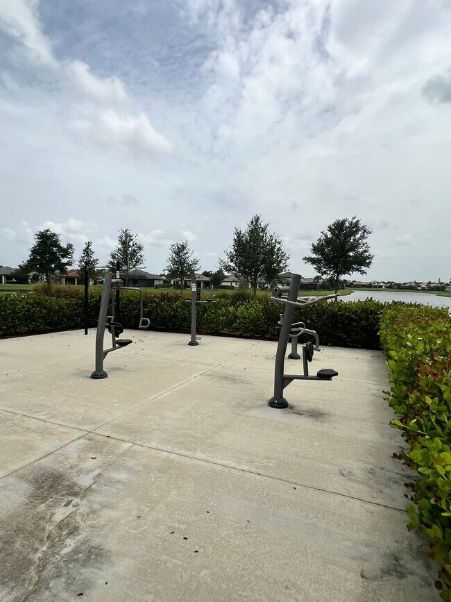 Building Photo - STUNNING LAKEFRONT 3 BEDROOM, 2.5 BATH HOM...