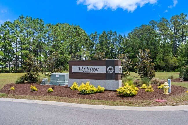 Building Photo - Modern 4BR Home with Screened Porch & Pond Views | Sun Colony, Longs SC