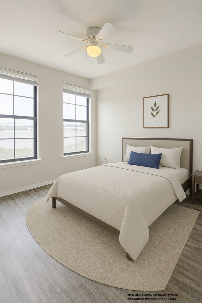 Building Photo - 2x2 Conveniently located. Large open concept, bright and updated: 1075 square feet.