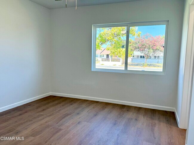 Building Photo - 7741 De Soto Ave