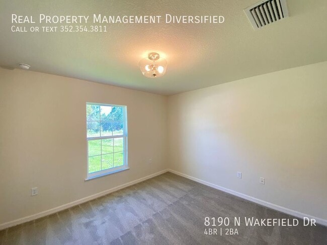 Building Photo - 8190 N Wakefield Dr