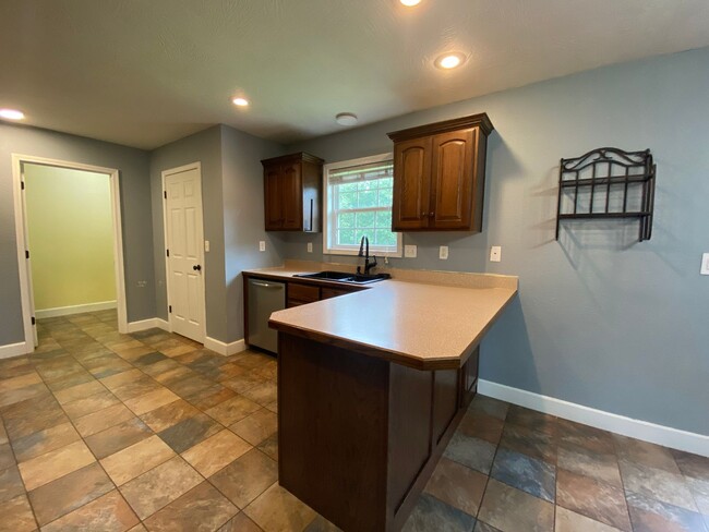 Building Photo - Your Dream Rental Awaits in Osage Hills – ...