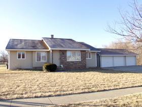 Left side of this ranch style duplex - with 2 car garage - 5000 Twana Dr