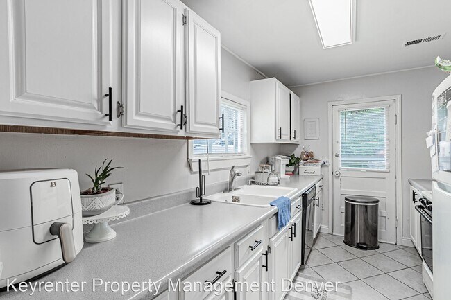 Building Photo - 3 br, 1 bath House - 7309 W 60th Ave