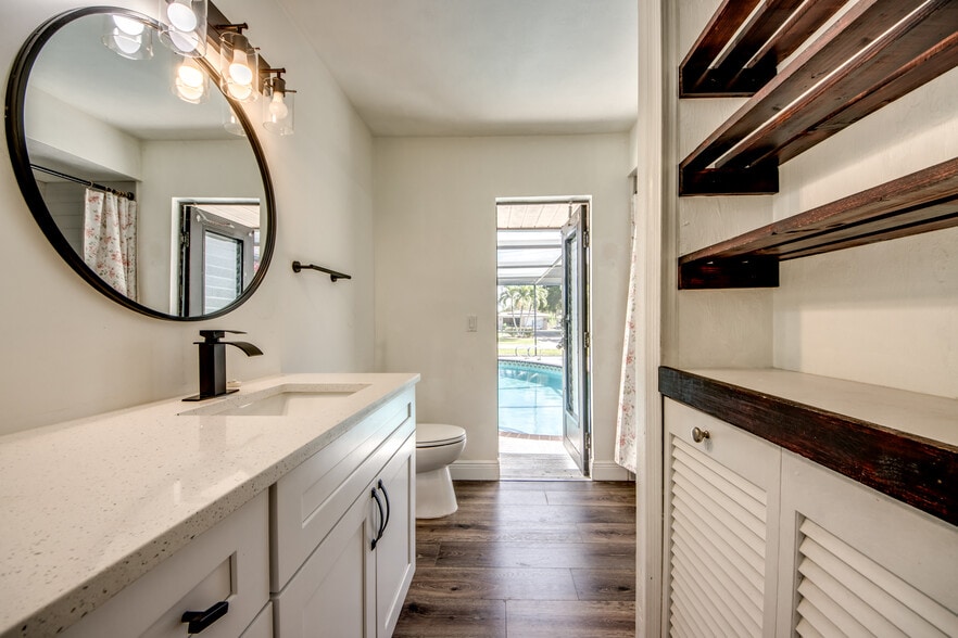 Updated Guest/Pool bath has tub and shower. Also has newly updated designer fixtures. - 2316 Everest Pky