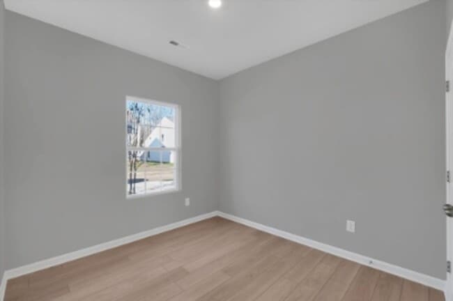 Building Photo - Stylish Living with Convenience at Your Doorstep