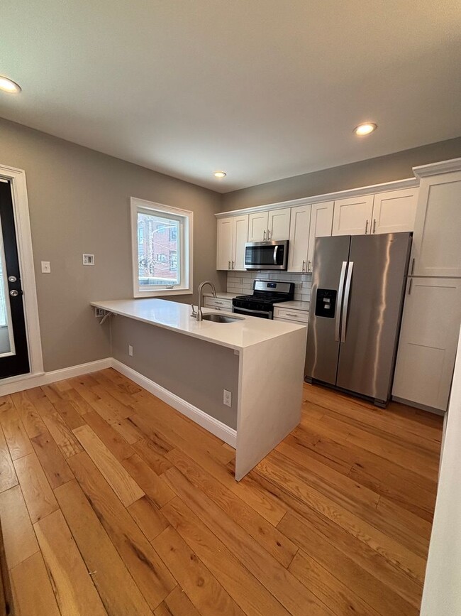 Building Photo - Gorgeous 4 Bedroom house with Three Roof-D...