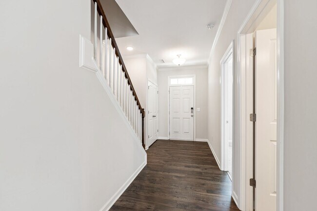Building Photo - Stylish 4-Bedroom Townhome with Backyard O...