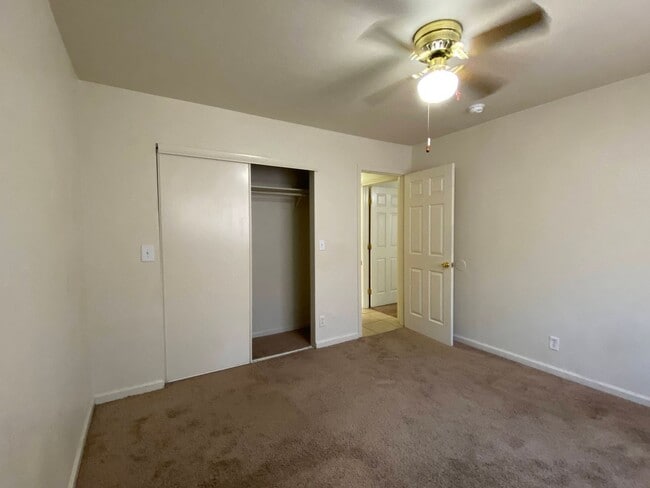 Building Photo - Spacious Duplex with Two Bedrooms, Two Bathrooms and Two Car Garage