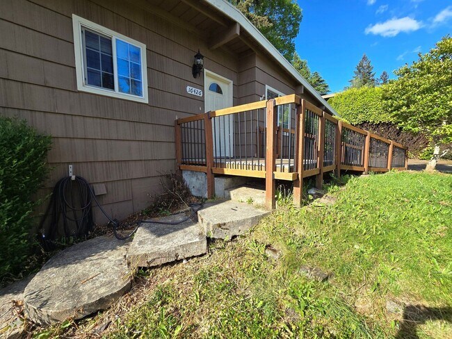 Building Photo - Updated 2-Story home with Day light basement. Big lot w/ RV & Boat parking