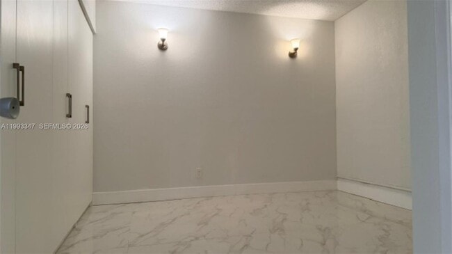 Building Photo - 19380 Collins Ave